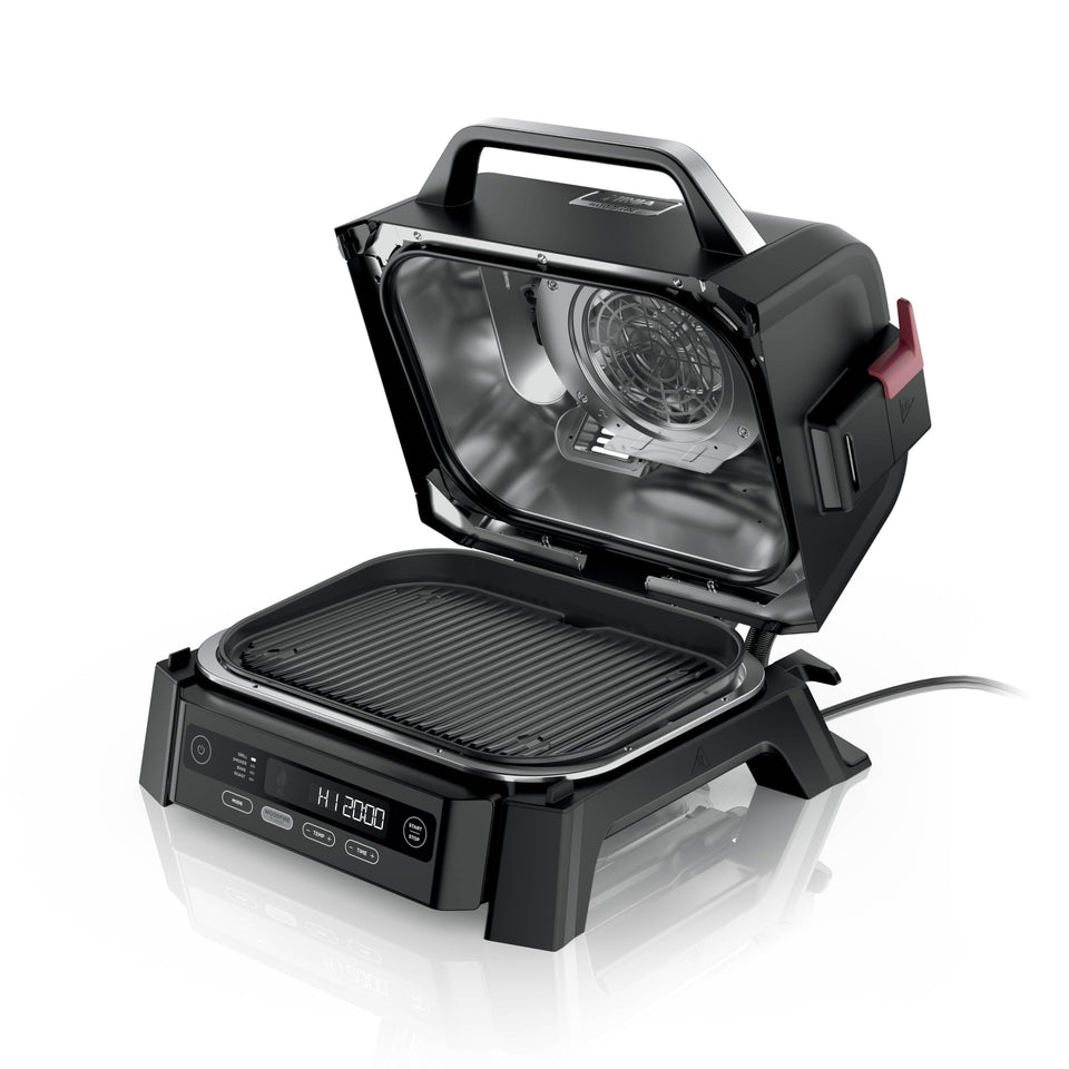 Ninja Woodfire grill front view showing rugged outdoor design for year-round cooking