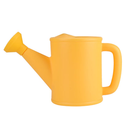 NIOIPXA small watering can for kids in yellow with 700ml capacity, easy for little hands.