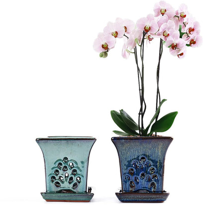 NiSevenLiving ceramic orchid pot in blue with attached saucer for tidy repotting.