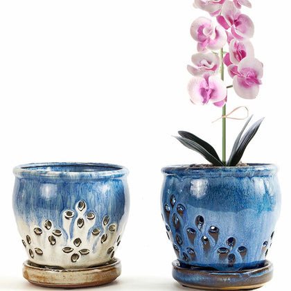 NiSevenLiving orchid pot with holes and attached saucer for improved air flow.