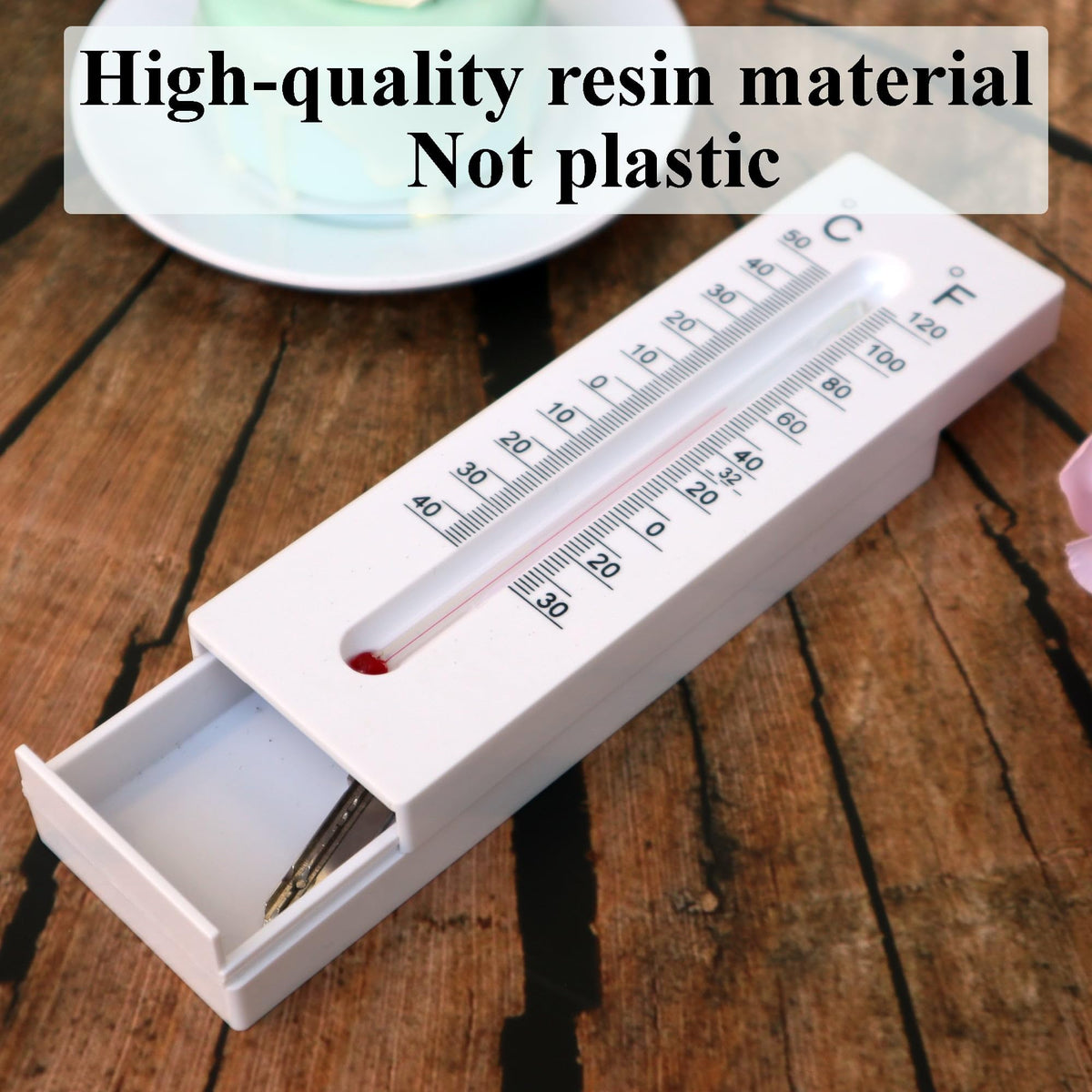 Niwhydi hide-a-key thermometer mounted wall discreetly stores keys and shows outdoor temperature.