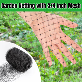 NONMON netting draped over a fruit tree in garden.