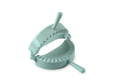 Nordic Ware Pocket Pie Press showing the crimp-seal edge for neat personal pies.