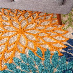 Nourison Aloha dining area-ready rug supports frequent foot traffic.