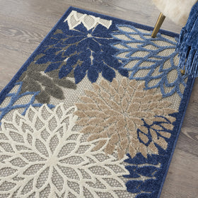Nourison Aloha flat weave shows raised patterns for durable texture.