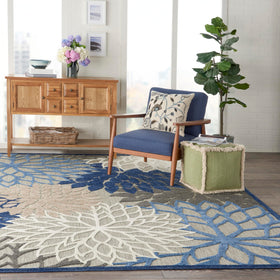 Nourison Aloha flat-weave texture adds a tactile high-low pattern underfoot.