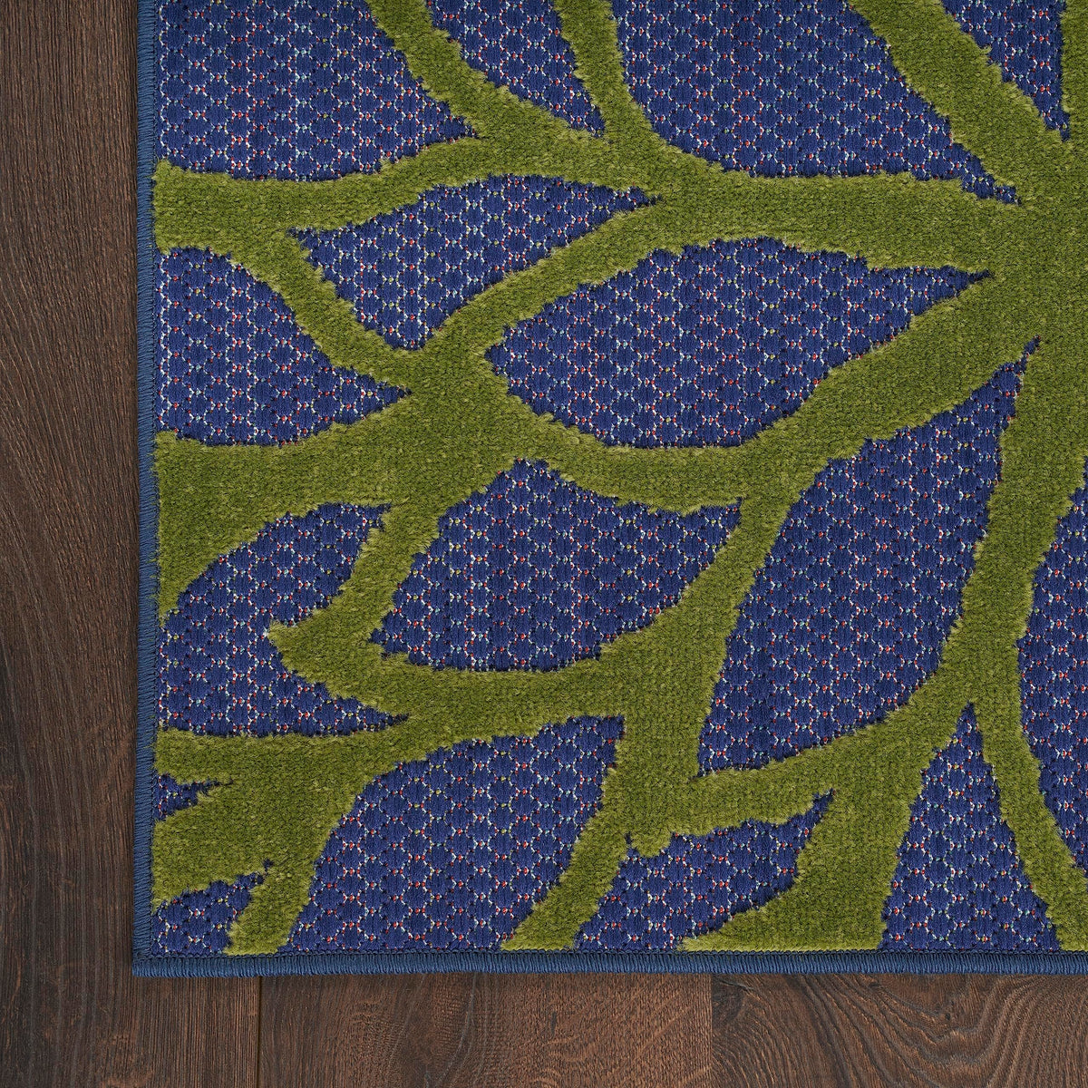 Nourison Aloha rug with stain-resistant fibers supports everyday outdoor use.
