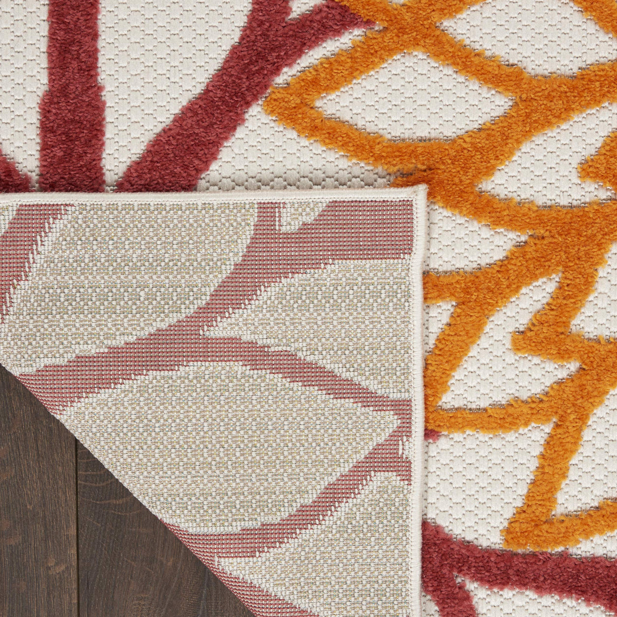 Nourison Aloha rug cleans easily with hose rinse and air dry.