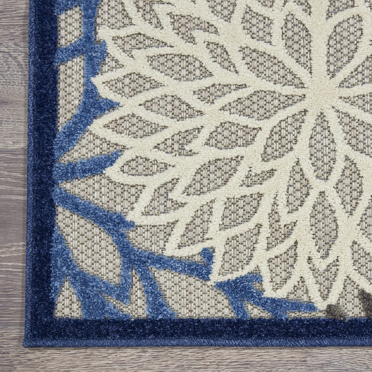 Nourison Aloha rug pad recommended for stability and floor protection.