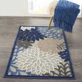 Nourison Aloha fibers are stain-resistant polypropylene for easy cleaning outdoors.