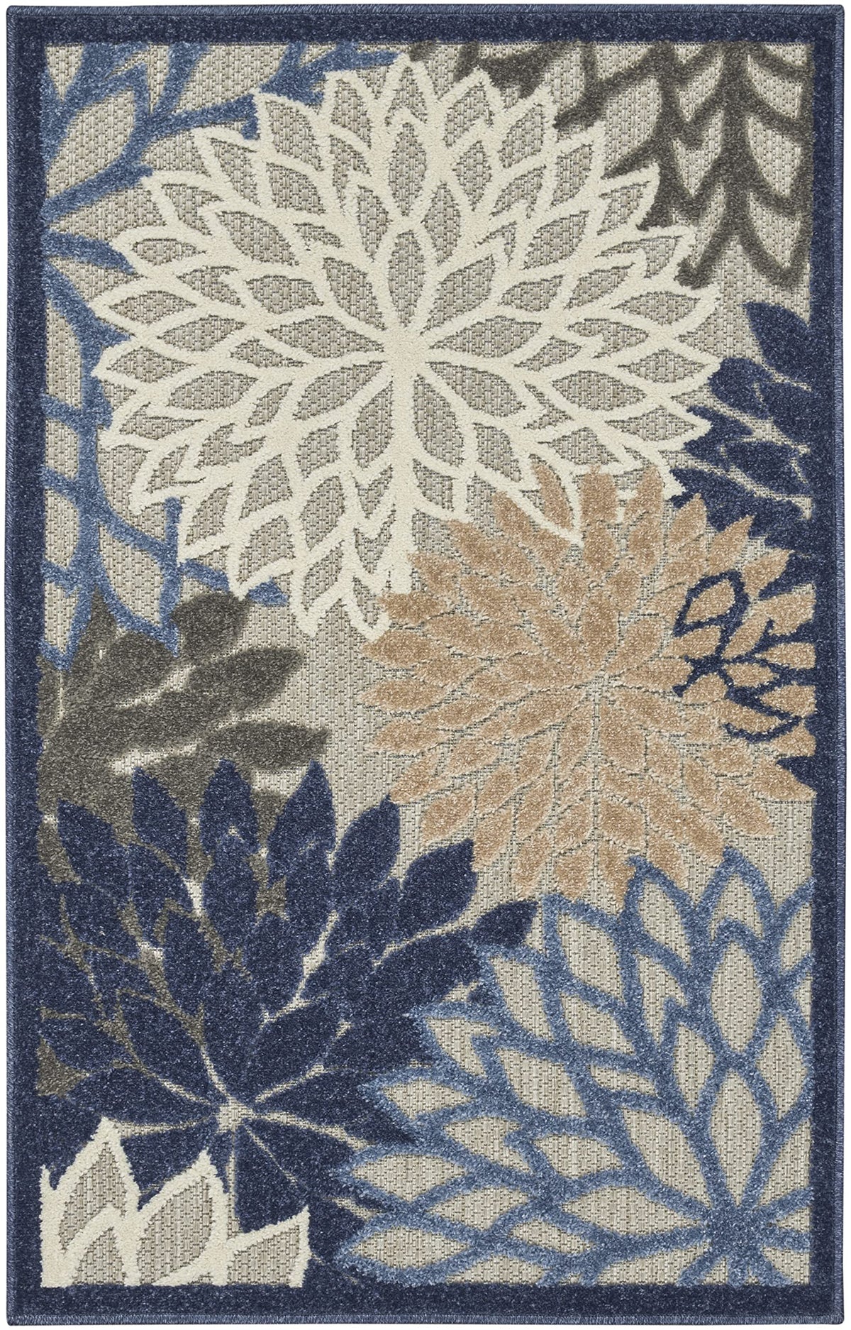 Nourison Aloha surface features a textured high-low pile for tactile outdoor appeal.