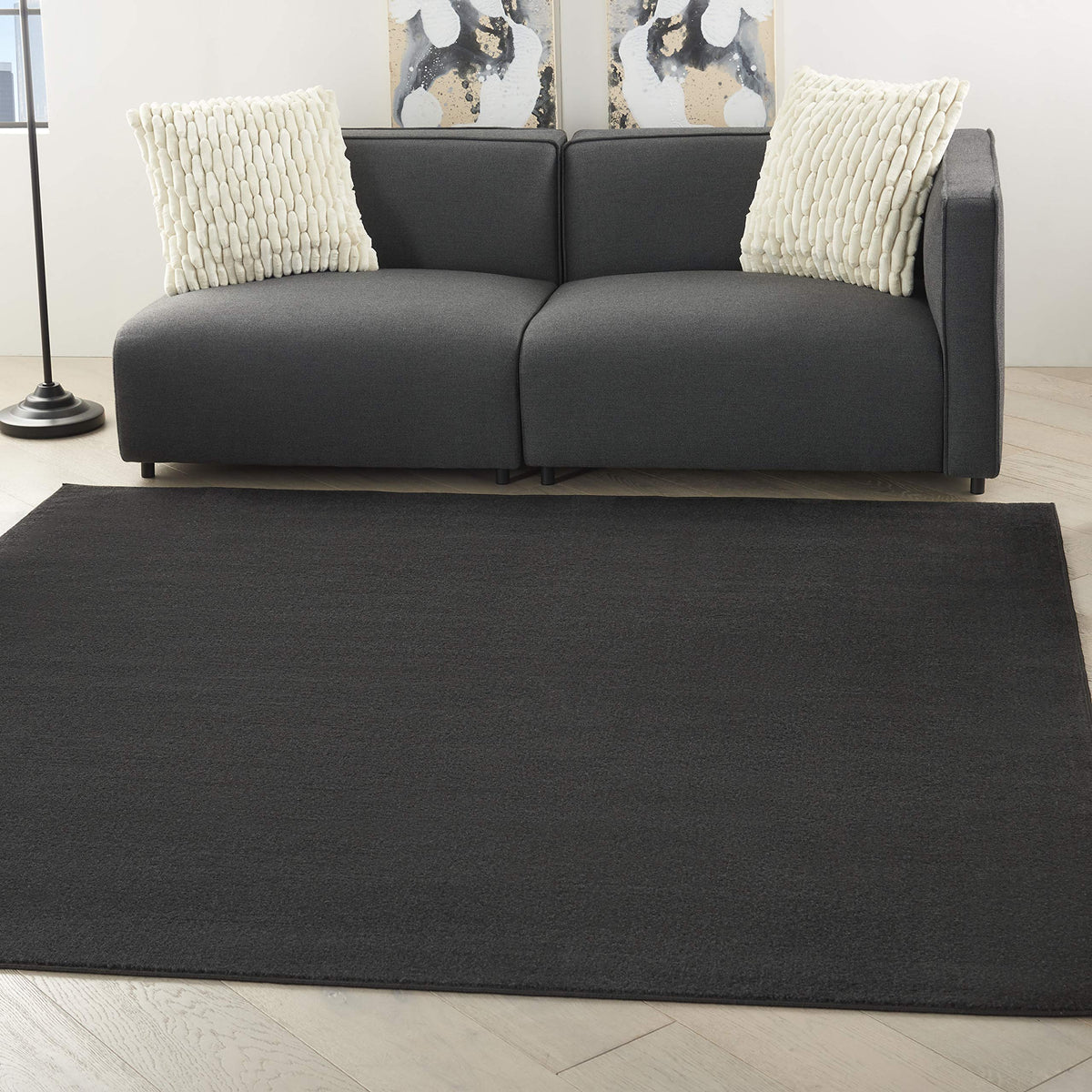 Nourison Essentials Black 5' x Square rug, front view, rugged indoor-outdoor durability.