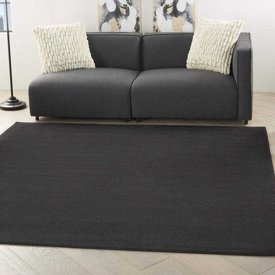 Nourison Essentials Black 5' x Square rug, front view, rugged indoor-outdoor durability.