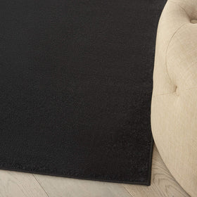 Nourison Essentials Black 5' x Square rug texture closeup, soft low-pile feel.