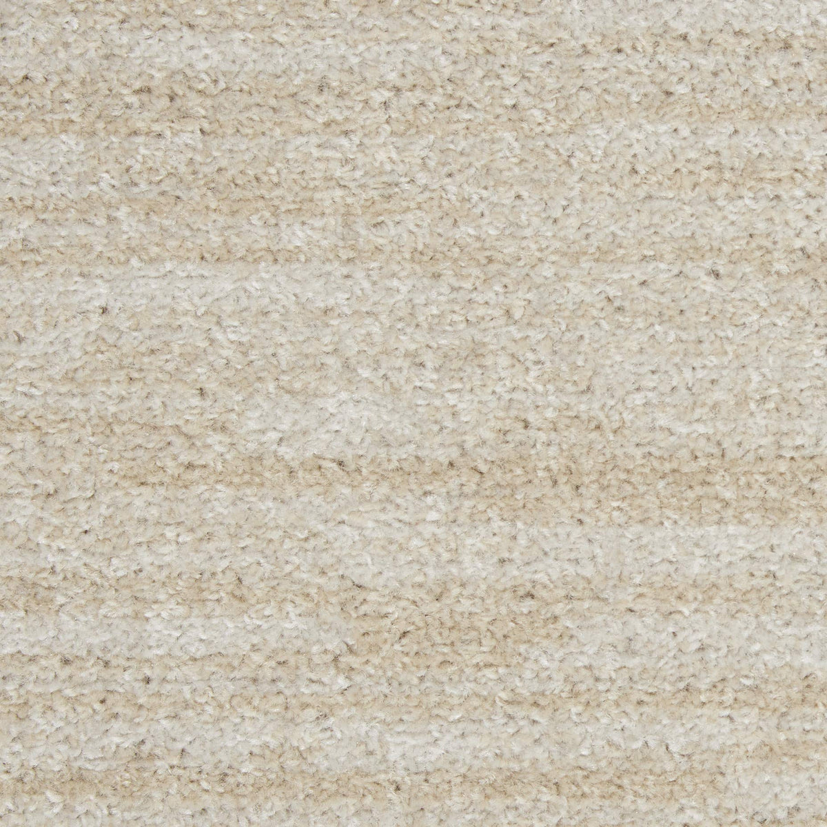 Nourison Essentials Ivory Beige edge-serged detail highlights durability and clean finish.