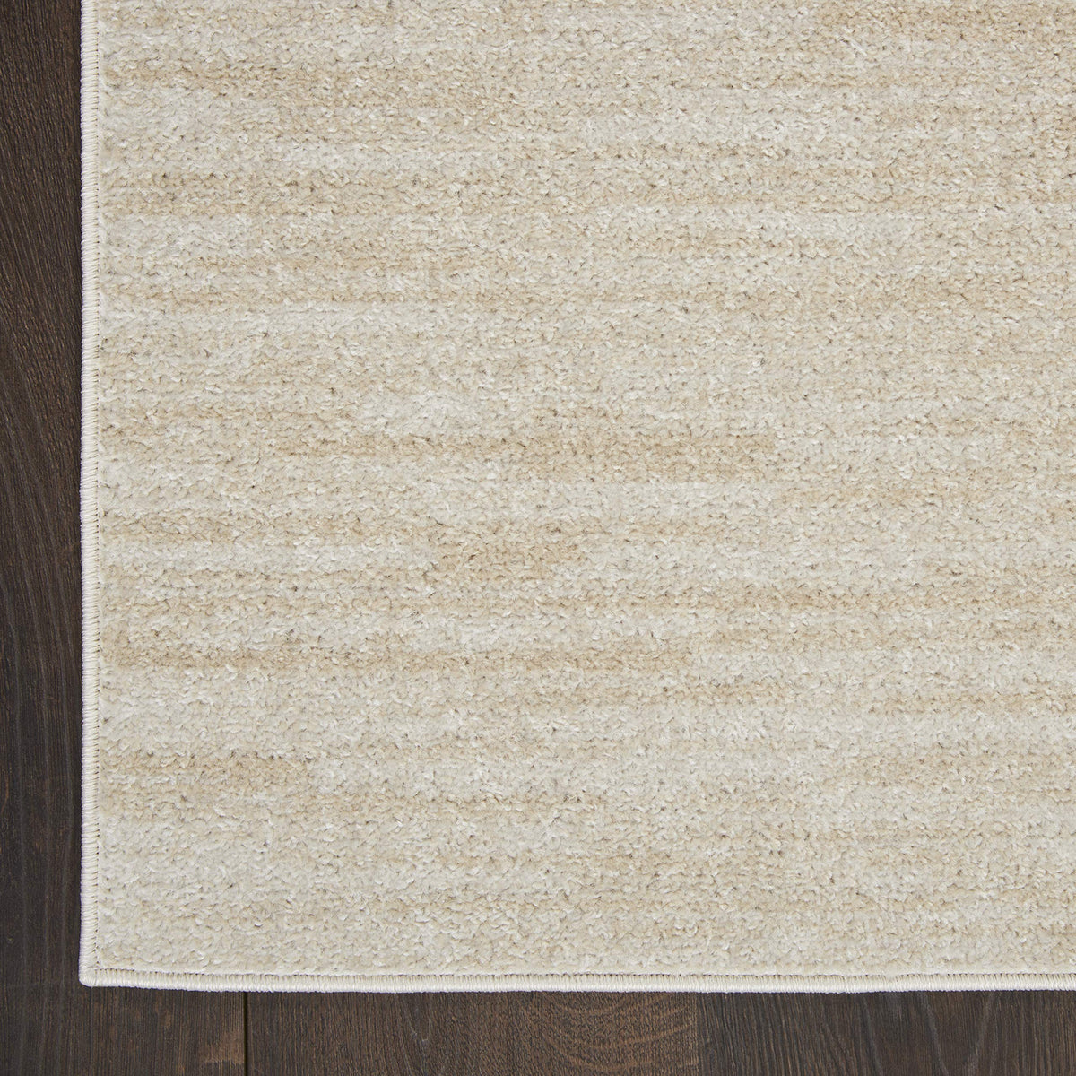 Nourison Essentials Ivory Beige porch deck area demonstrates durable, easy-care performance.
