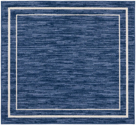 Nourison Essentials Navy/Ivory outdoor patio setup adds color and practical durability to a deck.