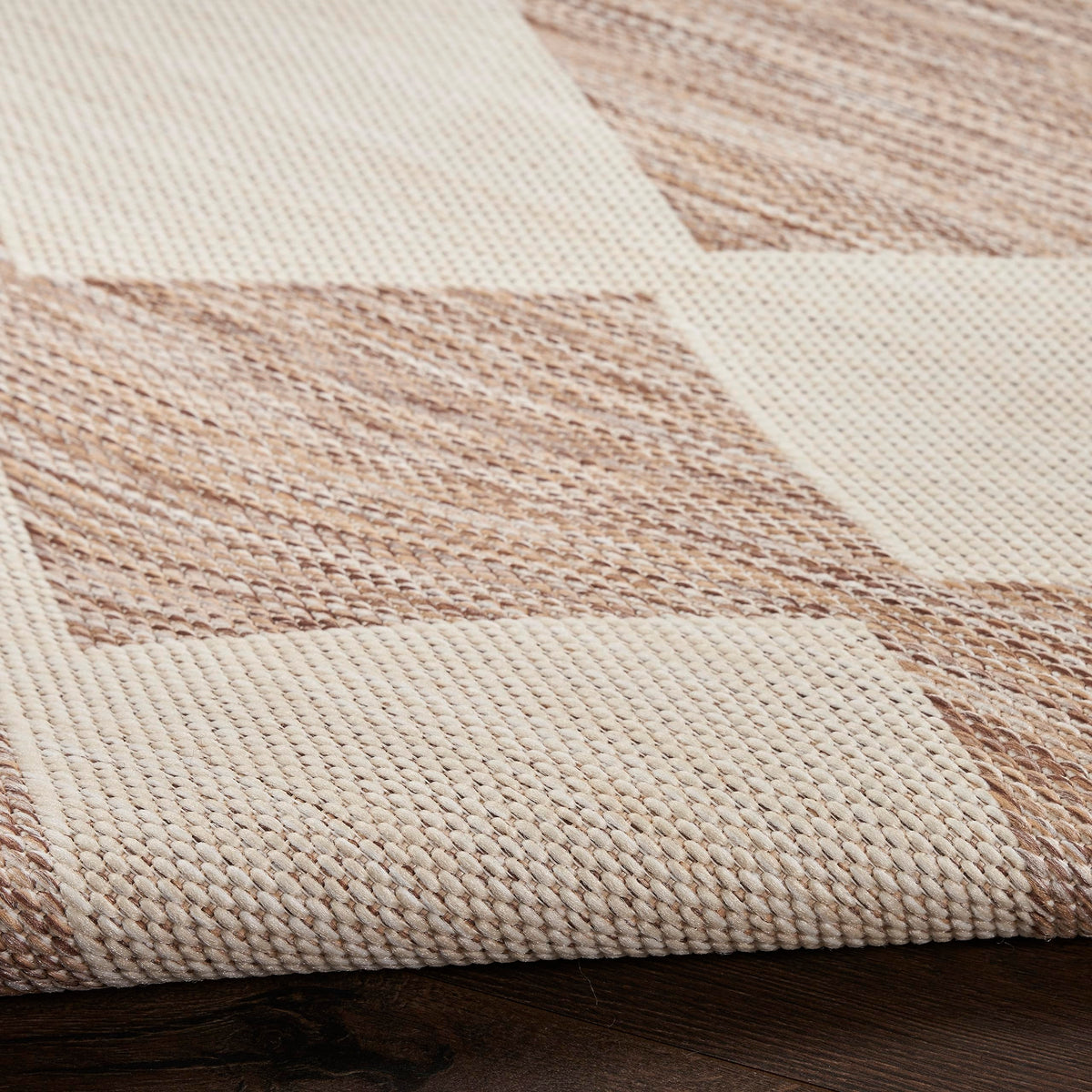 Nourison Positano beige demonstrates space-dyed color variations for visual interest