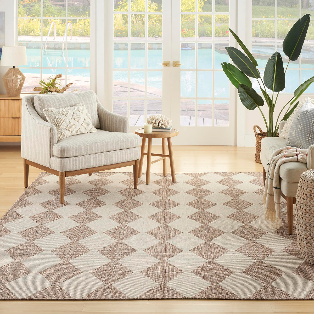 Close-up of the flat-weave texture on the Nourison Positano beige rug