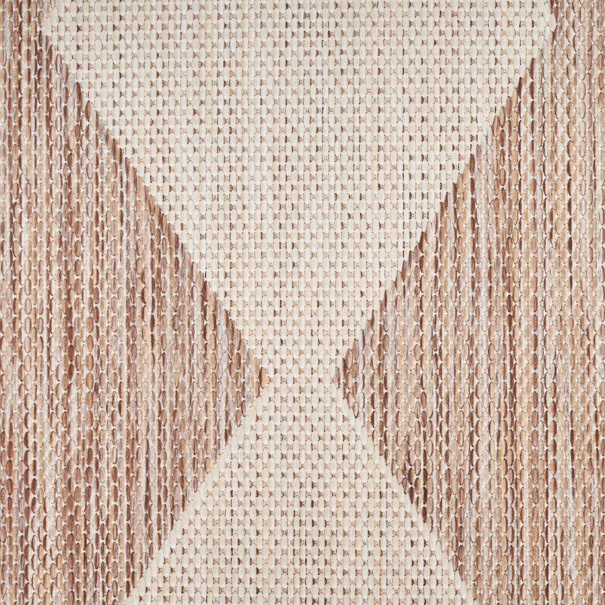 Nourison Positano beige rug on a porch elevating outdoor-to-indoor transition