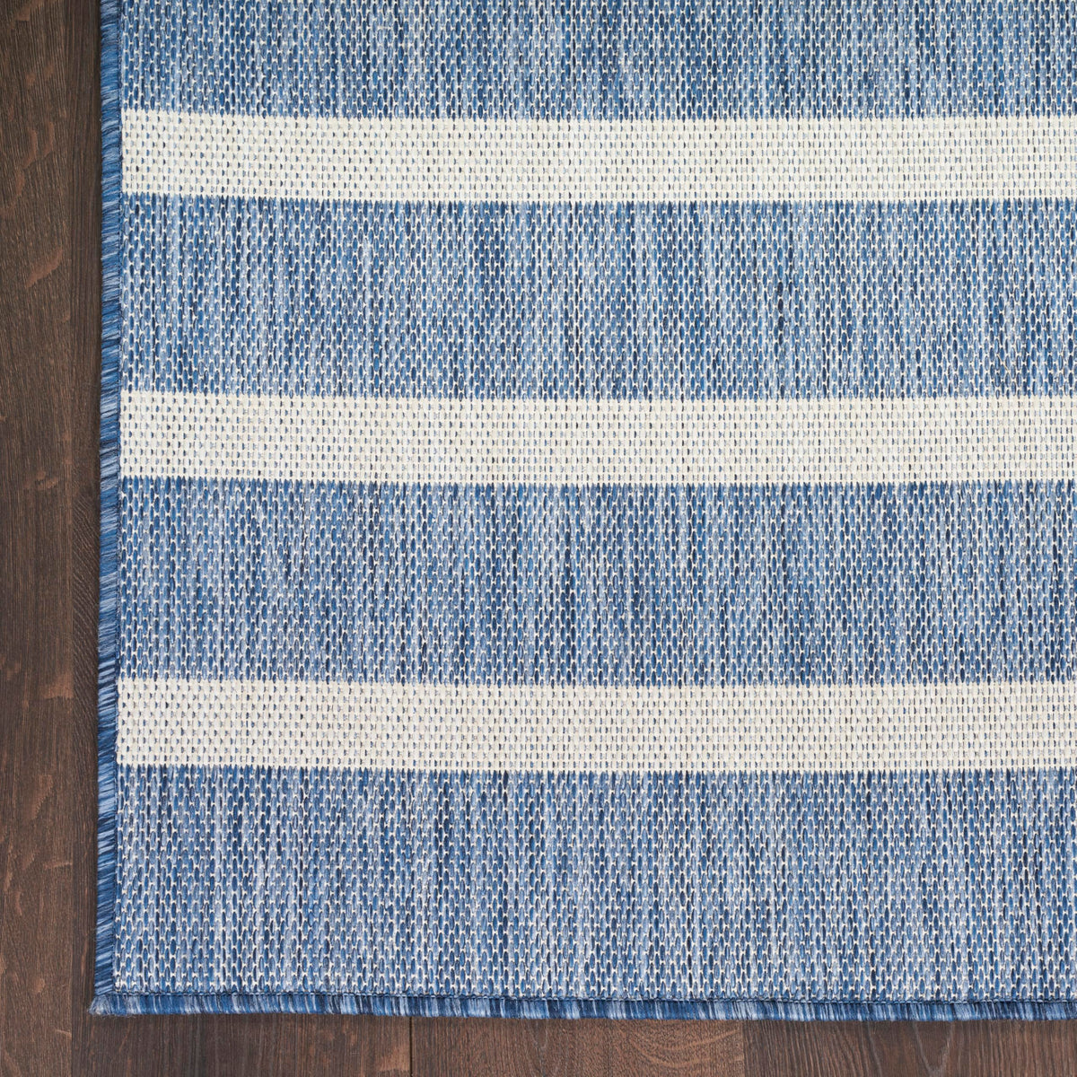 Nourison Positano durable polypropylene fibers resist wear.