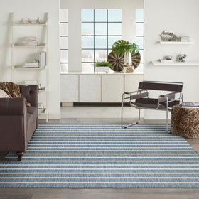 Nourison Positano flat weave navy ivory rug is easy to clean.