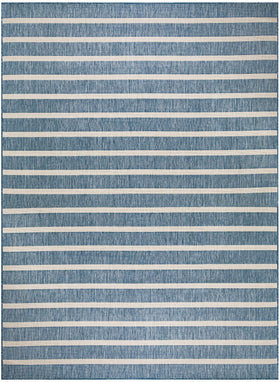 Nourison Positano navy ivory stripe suits indoor dining areas.