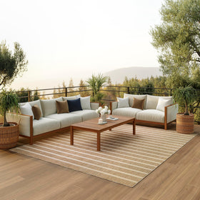 Nourison Positano outdoor rug beige ivory on patio, durable and easy to clean