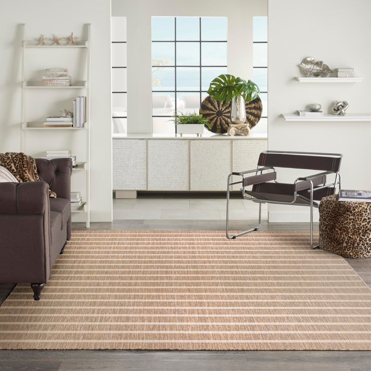 Nourison Positano flat-weave close-up showing textured yarns and color variation