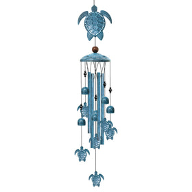 Nowpis Sea Turtle Wind Chime outdoors with blue rustic finish and turtle topper