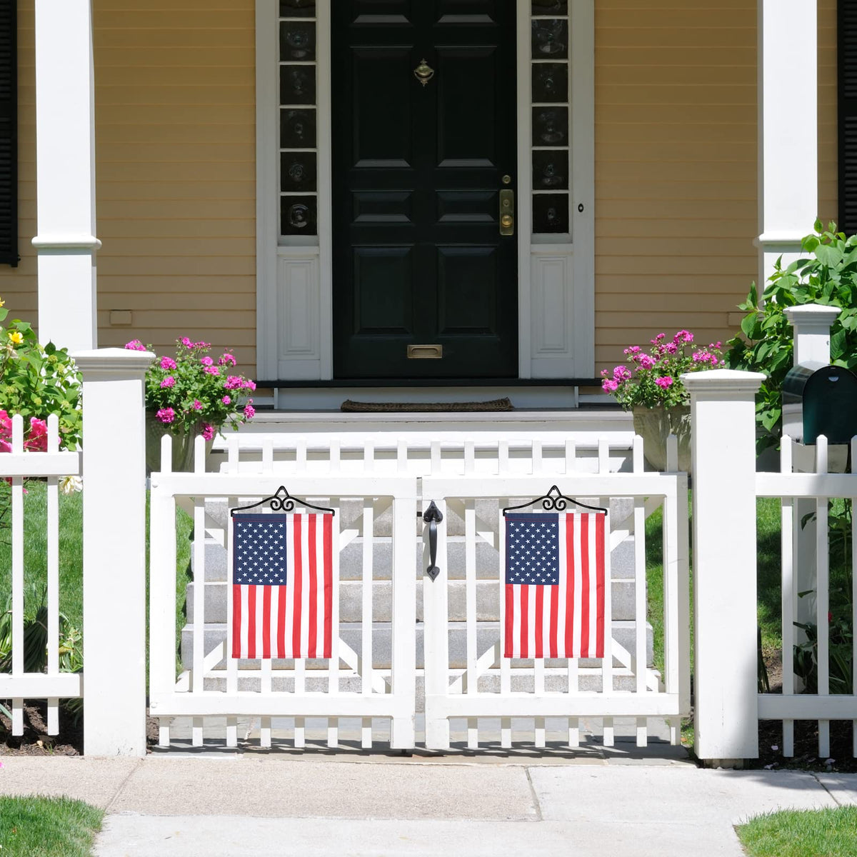 NQ flag wall hanger mounted on a gate displaying a welcome flag.