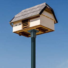 Nuanchu mailbox mounting plate on a fence post offering durable support