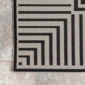 nuLOOM Asha versatile border style anchors furniture layouts.