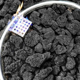 NUPICK lava rock fire pit setup with deep charcoal tones for a modern glow.