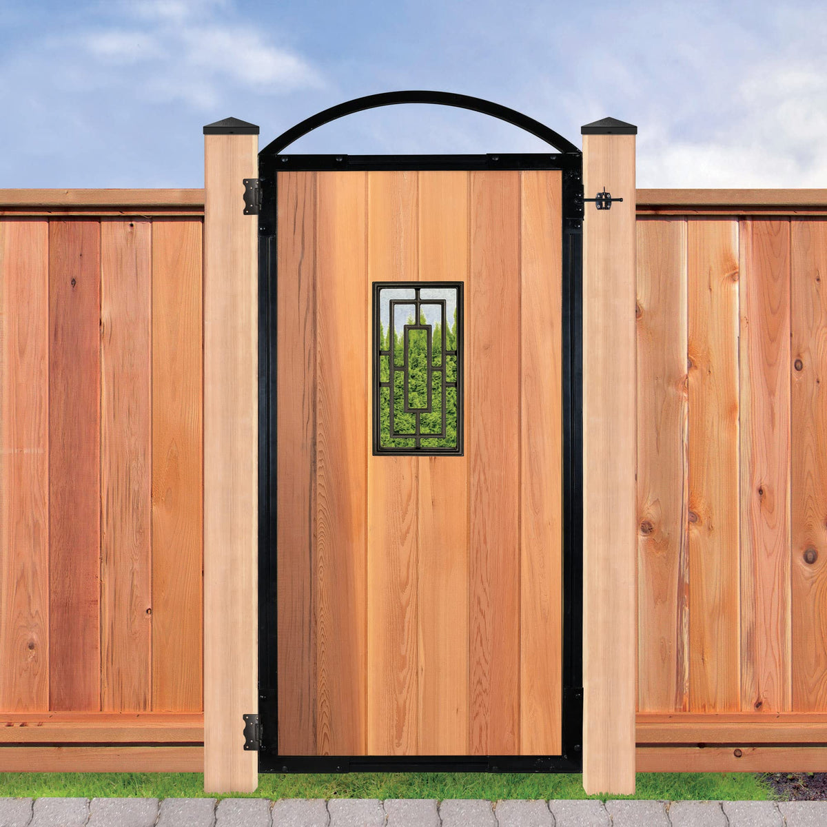 Nuvo Iron decorative insert installed on a fence panel with durable aluminum build