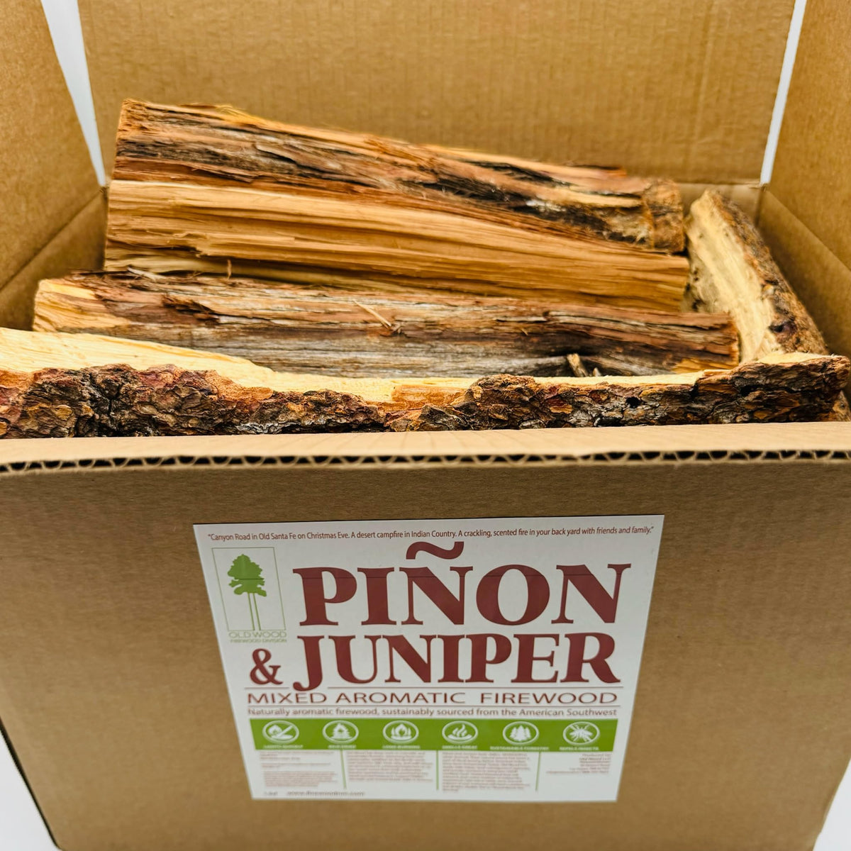 Nuvo Iron Pinon-Juniper firewood logs measuring 8–14 inches for steady indoor or outdoor fires.