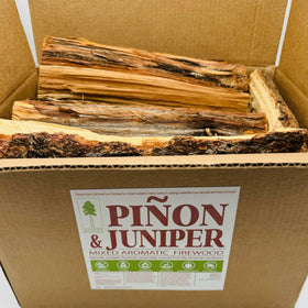 Nuvo Iron Pinon-Juniper firewood logs measuring 8–14 inches for steady indoor or outdoor fires.