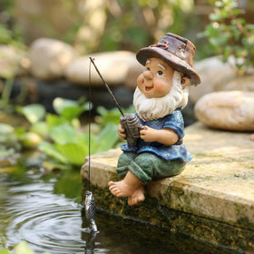 NYSCURE miniature statue by a plant pot, detailed beard and hat.
