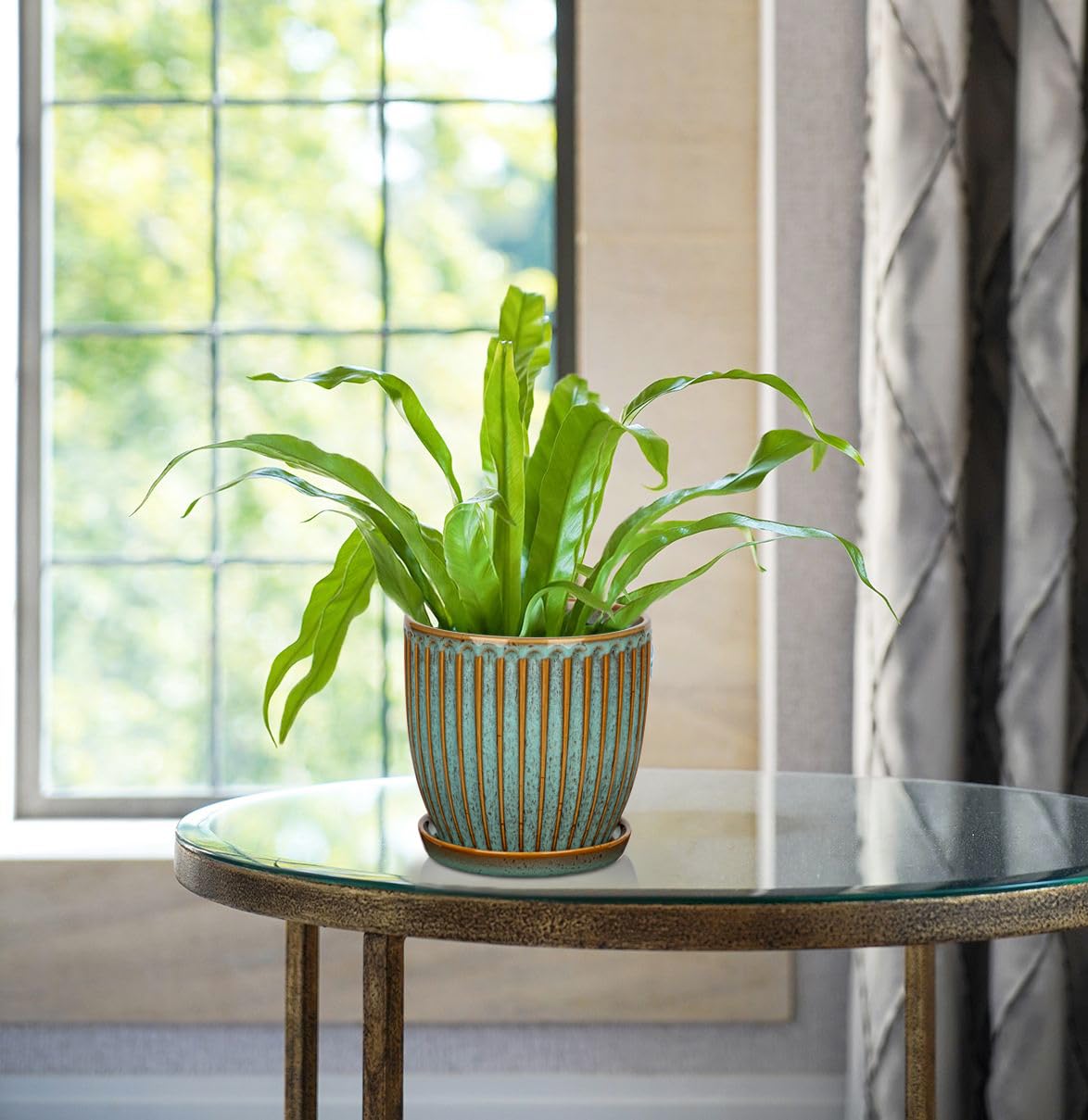 Oairse small ceramic pot suitable for succulents and tiny plants.