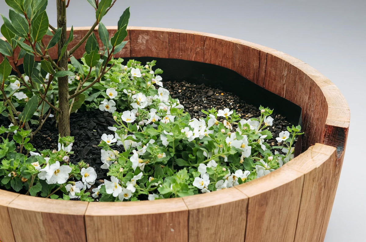 OAKENZ half-barrel liner kit with mesh for airflow and soil balance.