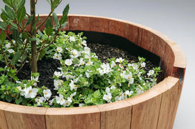 OAKENZ half-barrel liner kit with mesh for airflow and soil balance.
