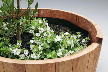 OAKENZ half-barrel liner kit with mesh for airflow and soil balance.