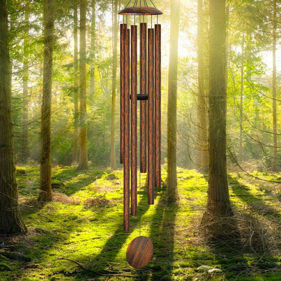 ODRODR 66-inch outdoor wind chimes delivering deep tones in a lush garden.