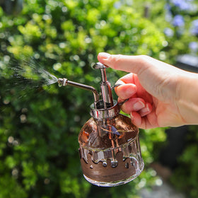 OFFIDIX one-hand watering bottle designed for comfortable indoor plant care.
