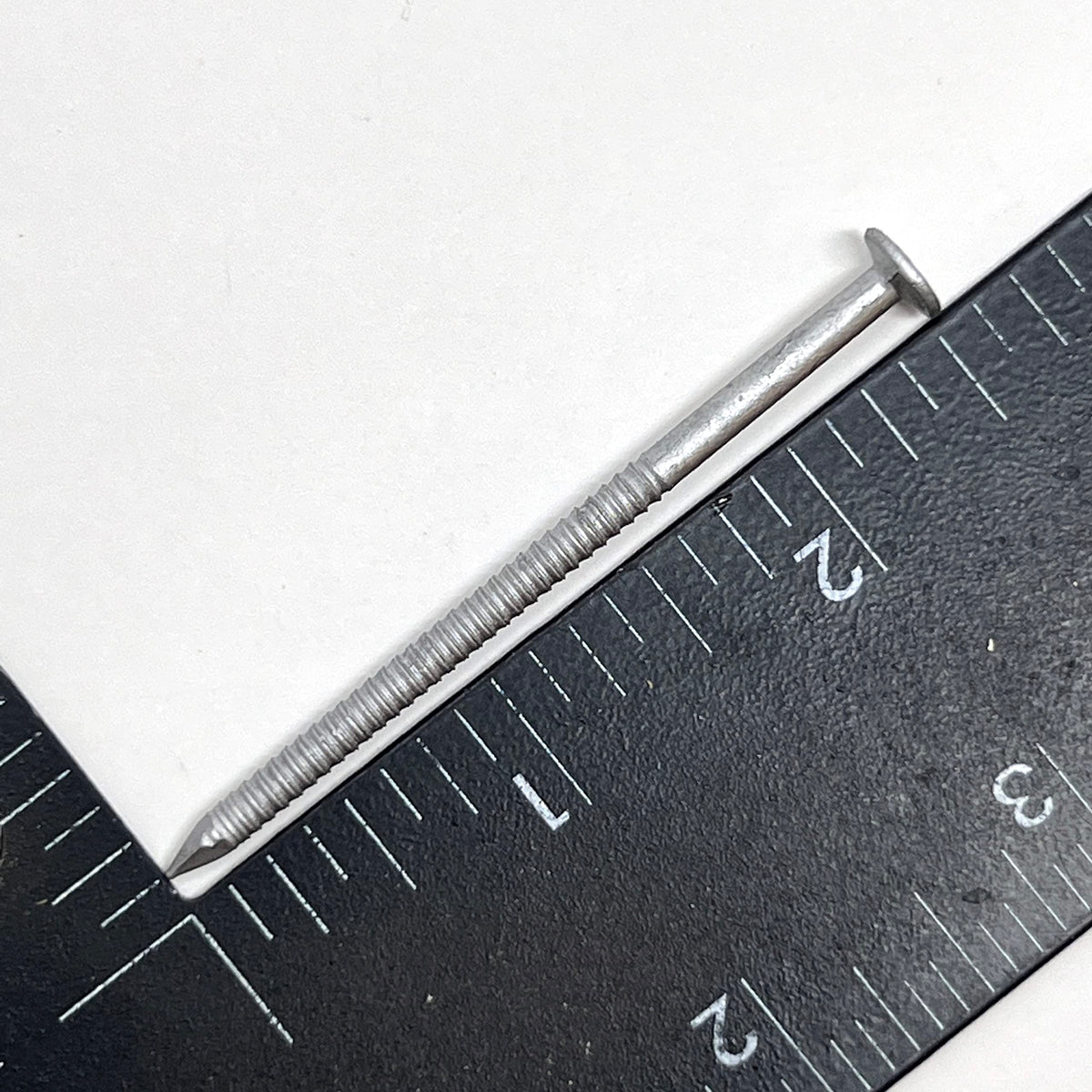Flat head of OHIY Huttig-Grip nail sits flush on surfaces