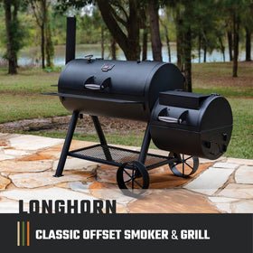Oklahoma Joe's Longhorn Offset Charcoal Smoker side firebox demonstrates convenient fuel refueling during cooks.