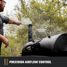 Oklahoma Joe's Longhorn Offset Charcoal Smoker side shelf provides prep space during grilling.
