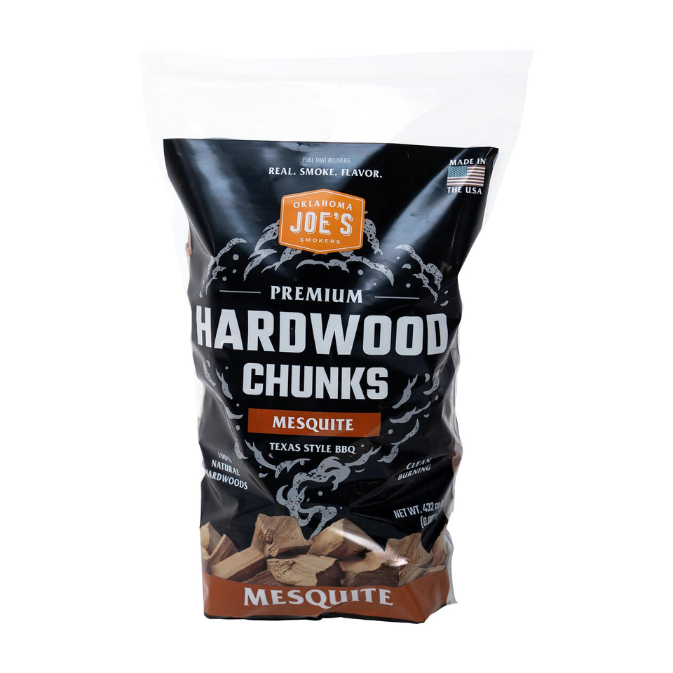 Oklahoma Joe's Mesquite wood chunks in bag for even smoking and bold Texas-style flavor.