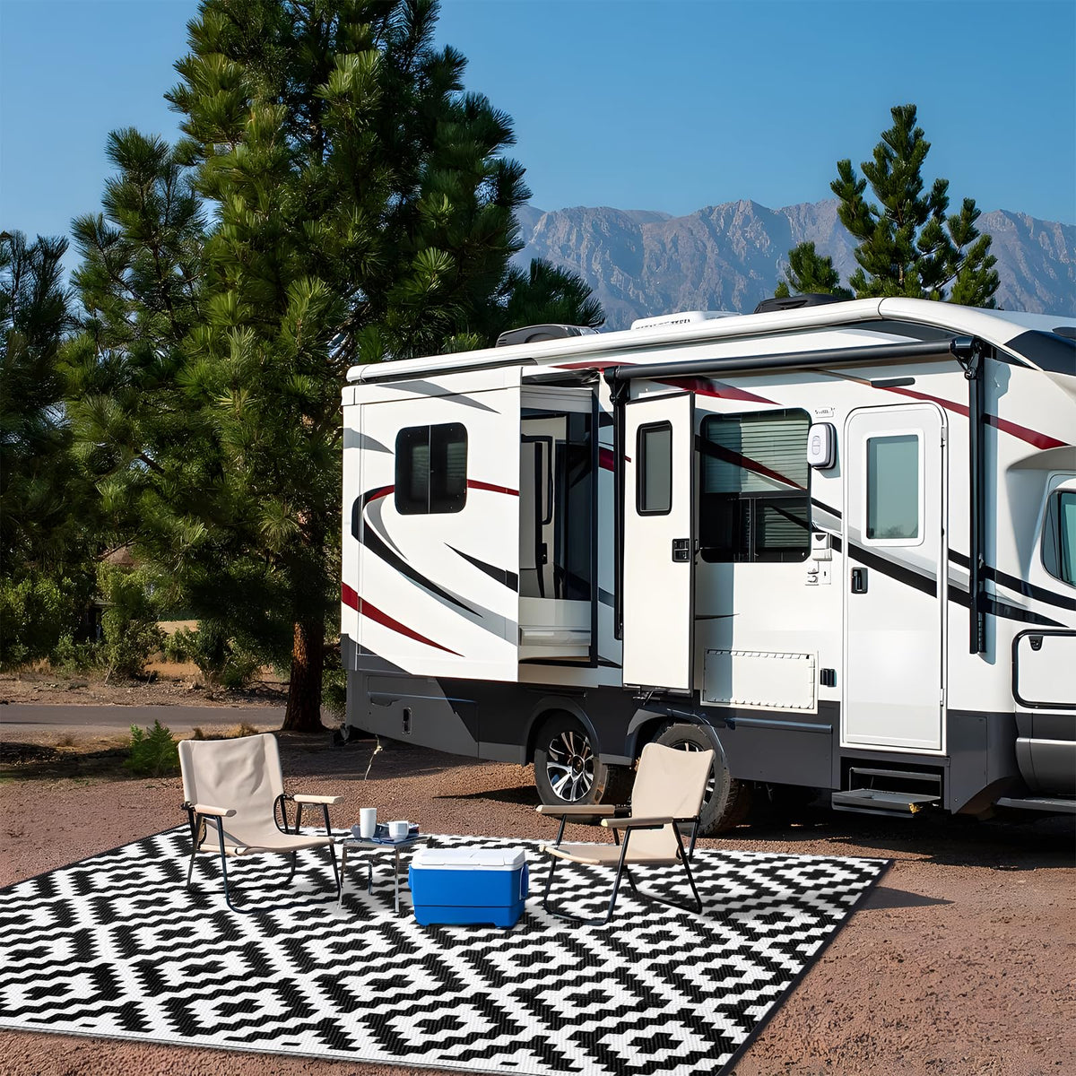 OLANLY black and white rug complements modern outdoor spaces.