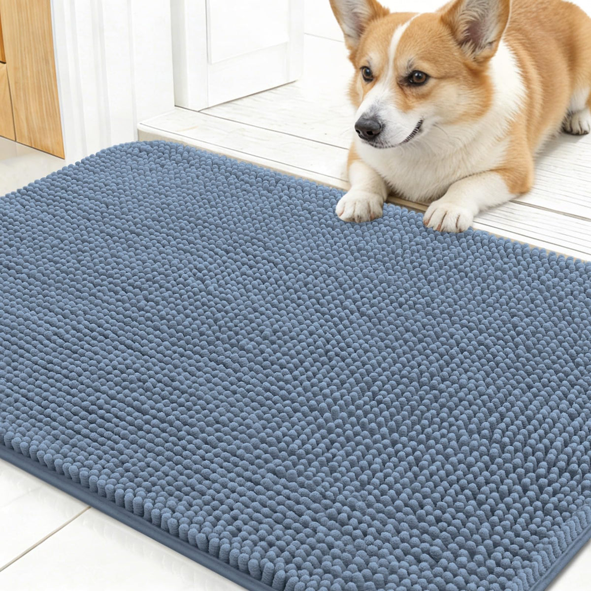 OLANLY dog door mat ready at entry with muddy paw prints, showing 24x16 size and use case